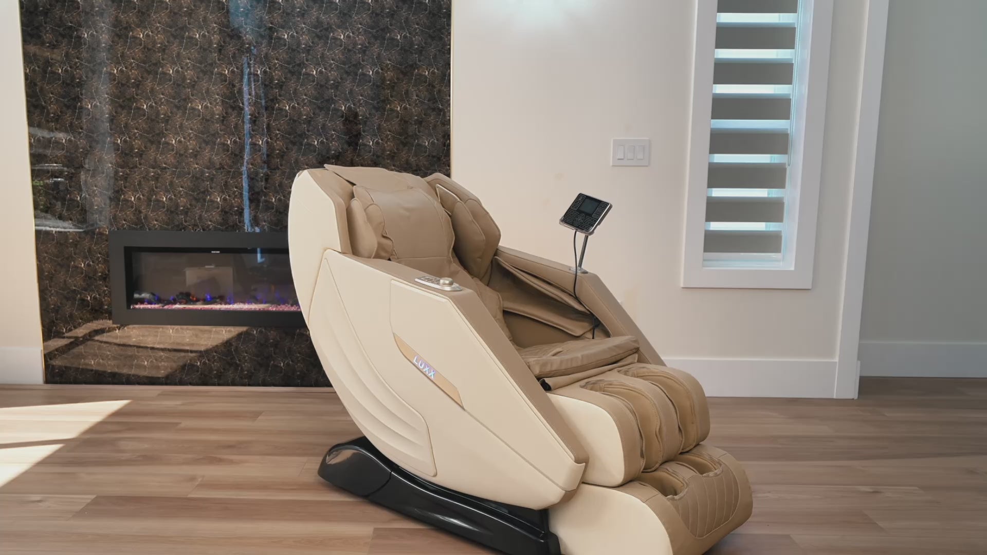 Load video: Woman enjoying beige luxury 4D zero gravity massage chair